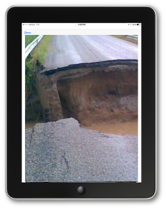 Picture of road damage from the Crisis Track mobile app